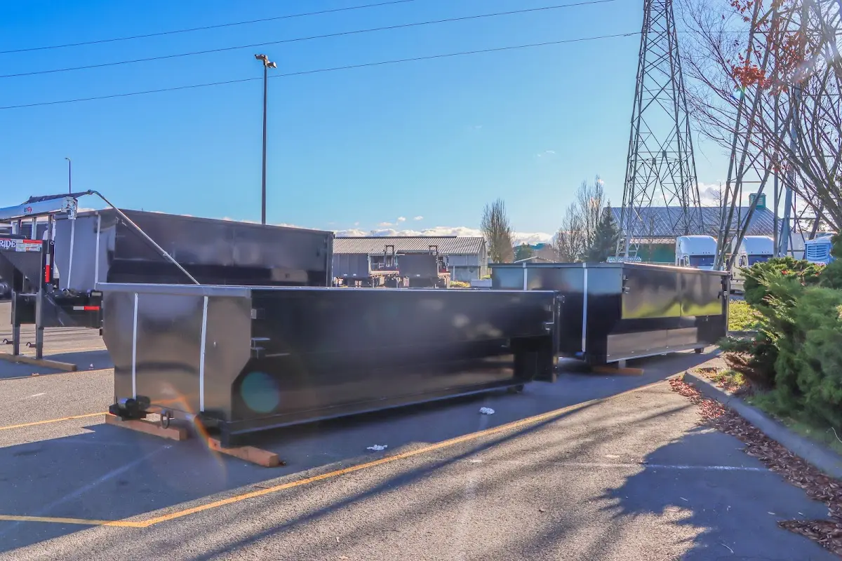 Roll-off dumpster ready for waste disposal at job site for 12 Yard Dumpster Rental in Greenville